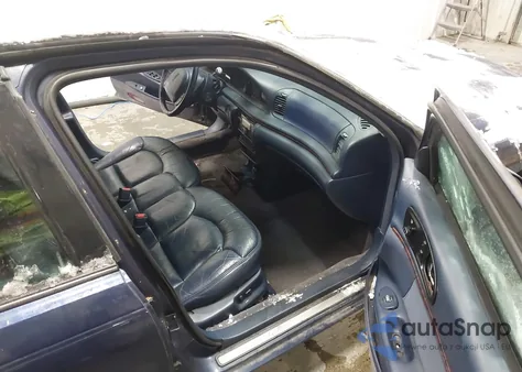 1995 Lincoln Continental z USA, uszkodzony, nr VIN 1LNLM97V1SY652715